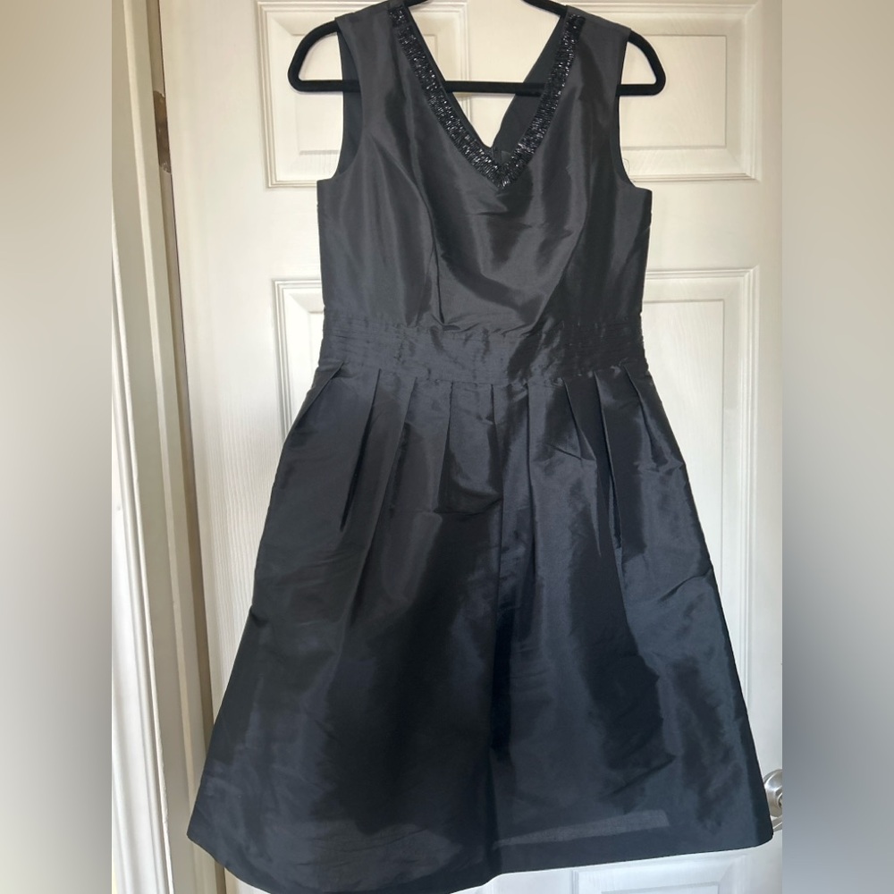Ellen Tracy Black crisp Satin, below knee length dress.